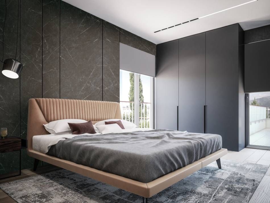 Dark marble wall wrap creating a elegant feature in bedroom design