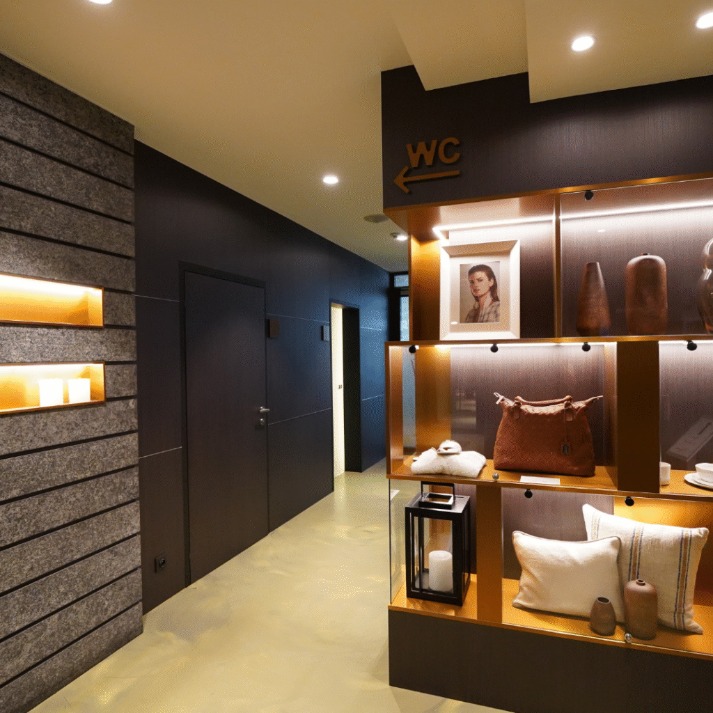 Dark brown vinyl wall wrap installed across hallway in a modern retail store